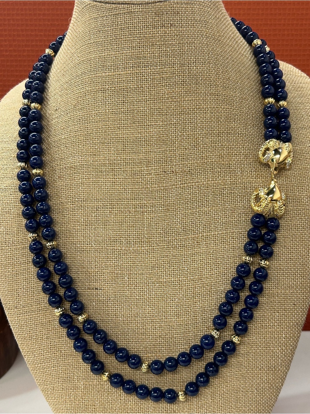 Kenneth Jay Lane for AVON golden Ram and faux Lapis Lucite bead necklace